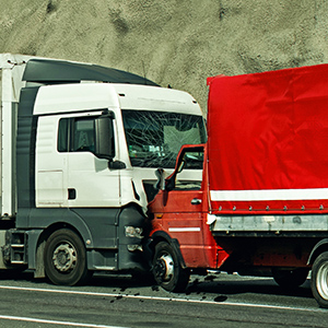 Semi-truck and red box truck collision; legal help for truck accident injuries in Chicago, Illinois.